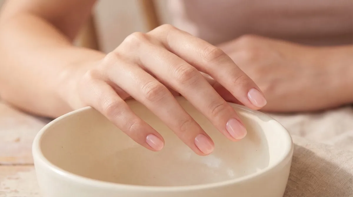 Short natural nails with a sheer pink BIAB builder gel overlay